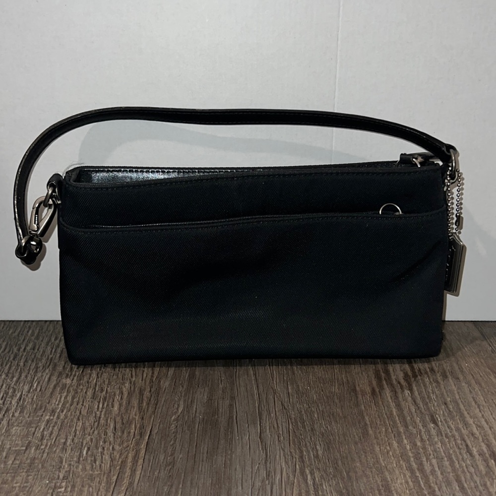 Coach black vinyl clutch purse